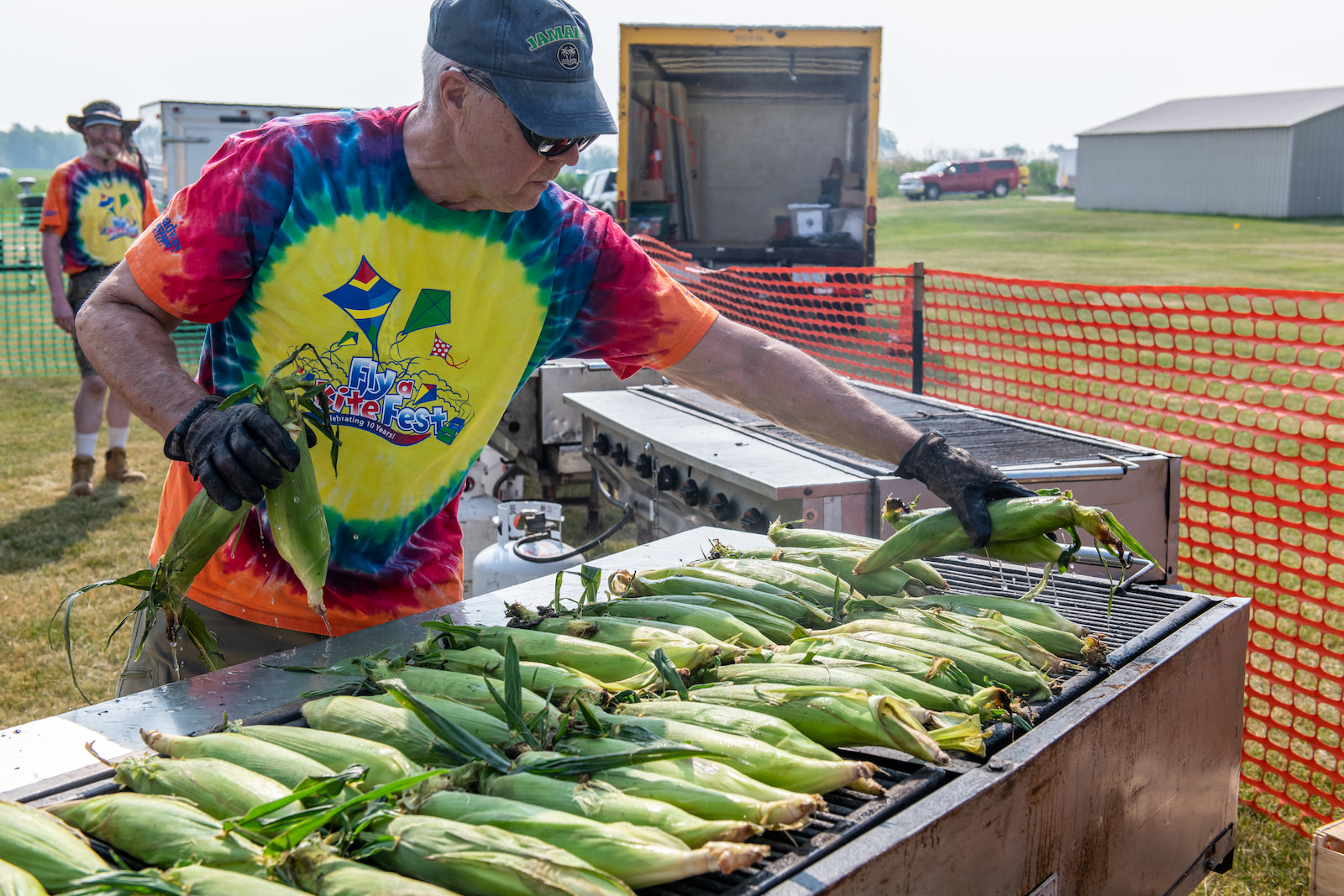 Fly a Kite Fest volunteer grilled corn on the cob